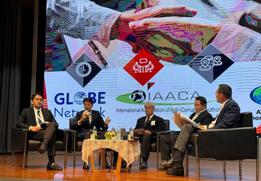 Mr Paul Lau, Assistant Director of the Hong Kong ICAC, explaining IAACA's role in the global fight against corruption at the World Anti-Corruption Conference 2024 in Bangkok, Thailand